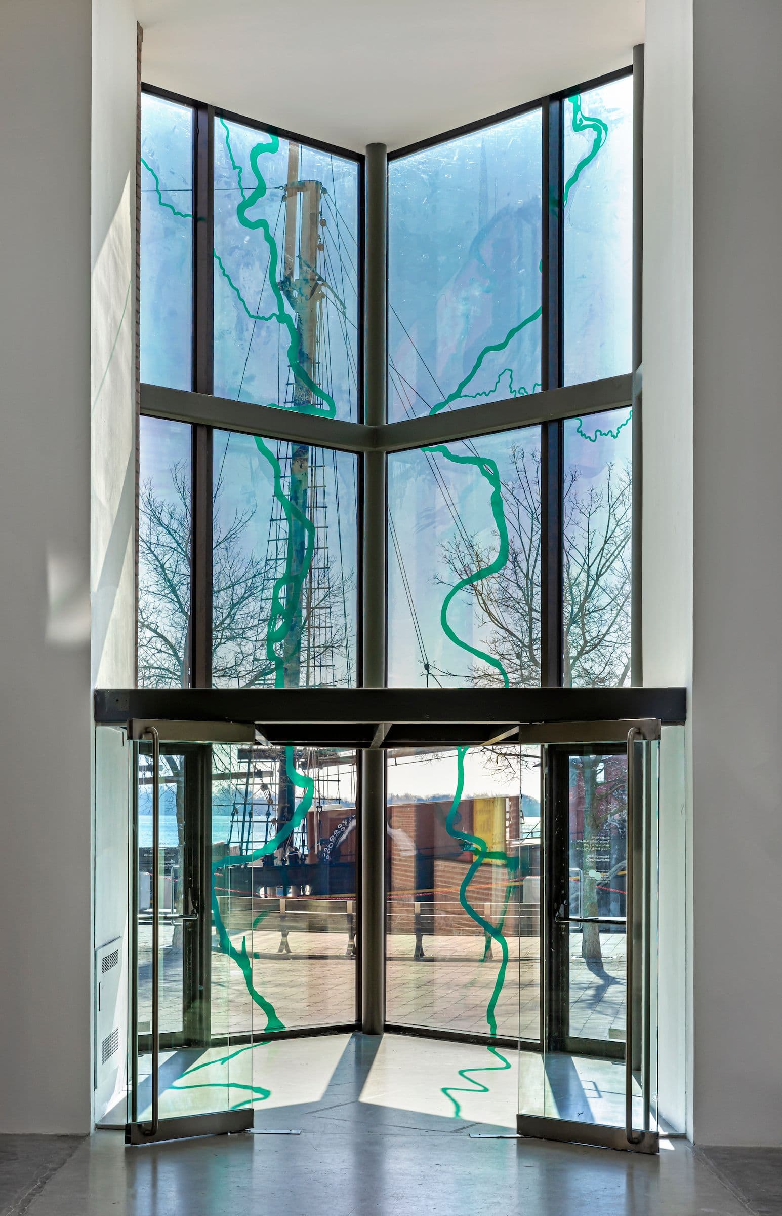 Simon Fuh, The Don at Dawn, The Humber at Dusk, 2022. Transparent vinyl installation. Courtesy the artist. Installation view: in parallel, The Power Plant, 2023.  Photo: Toni Hafkenscheid.