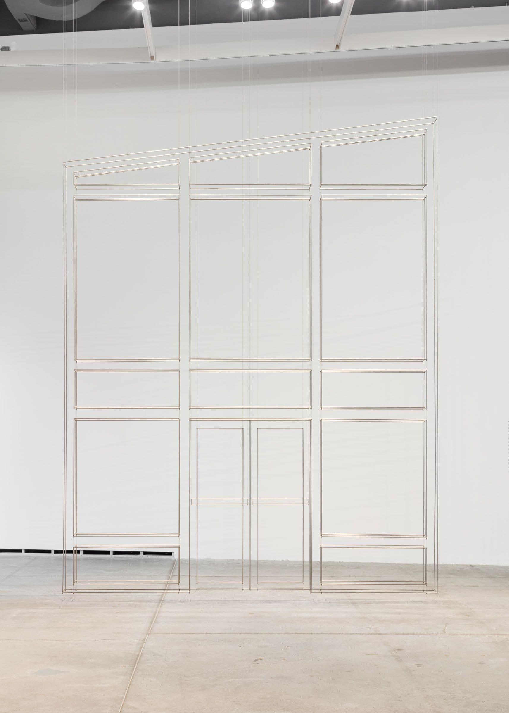 Terence Gower, Façade (Transparent), 2024. Suspended stainless steel sculpture, aircraft cable. Commissioned by The Power Plant Contemporary Art Gallery, 2024. Courtesy the artist and LABOR, Mexico City. Photo: LF Documentation.