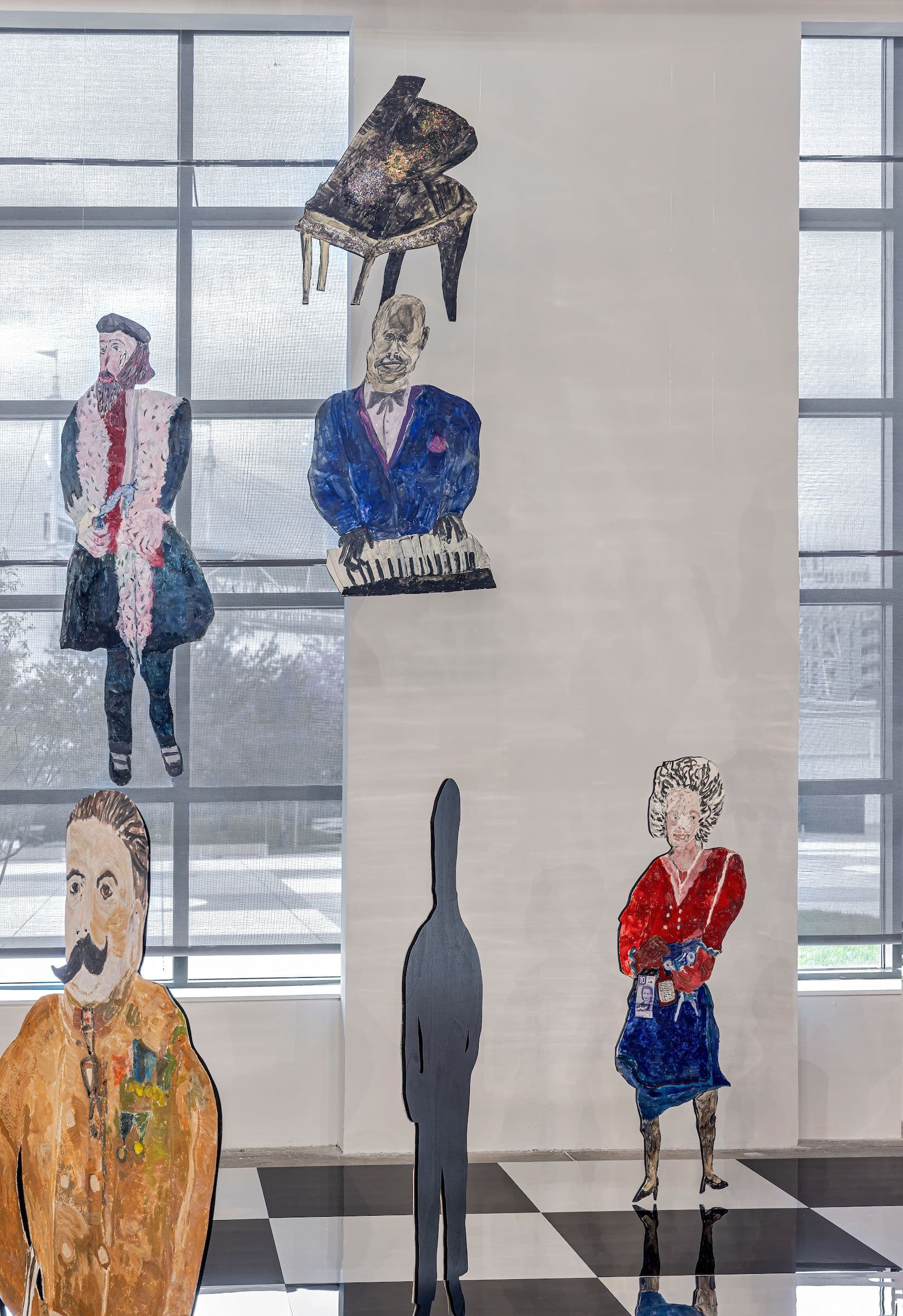 Anna Boghiguian, The Chess Game, 2022-23. Encaustic on Khadi paper, wood, acrylic panels, and mirror-coated Plexiglass. Ten chess pieces produced especially for the exhibition at The Power Plant, Toronto. Courtesy the artist. Photo: Toni Hafkenscheid.