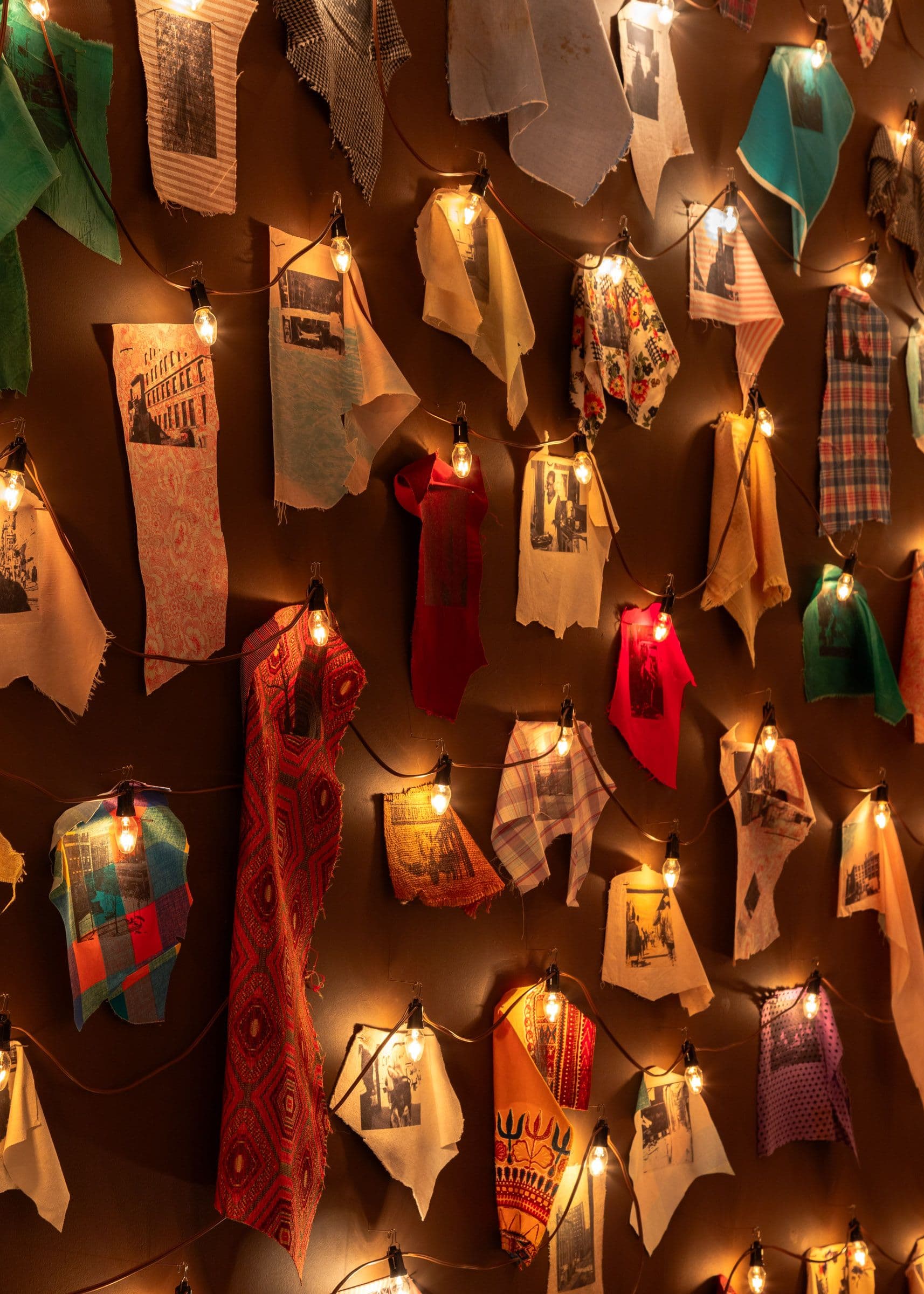 June Clark, Harlem Quilt, 1997. Photo transfers on fabric, light fixtures. Courtesy the artist and Daniel Faria Gallery. Installation view: Witness, The Power Plant Contemporary Art Gallery, Toronto, 2024. Photo: LF Documentation.