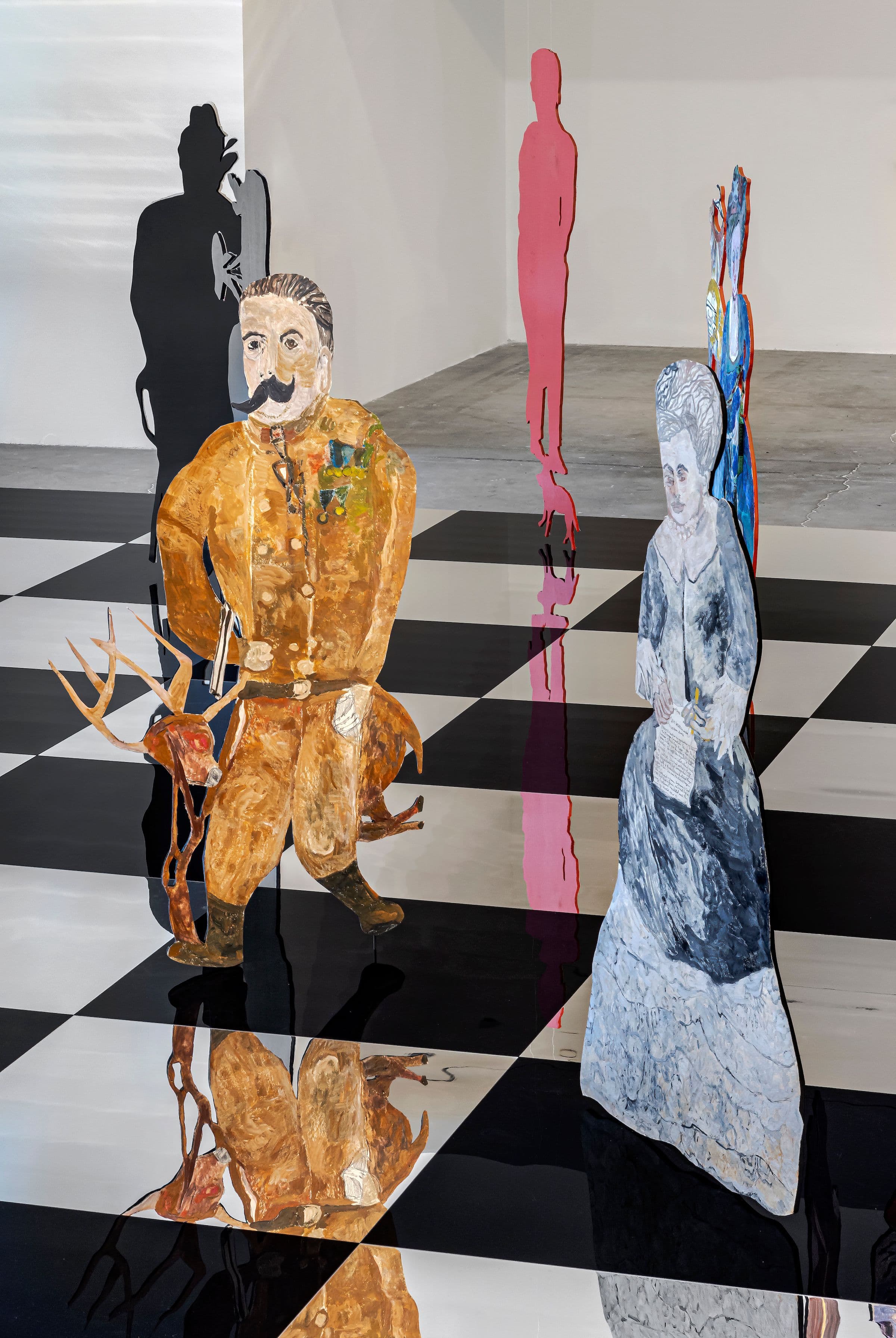 Anna Boghiguian, The Chess Game, 2022-23. Encaustic on Khadi paper, wood, acrylic panels, and mirror-coated Plexiglass. Ten chess pieces produced especially for the exhibition at The Power Plant, Toronto. Courtesy the artist. Photo: Toni Hafkenscheid.