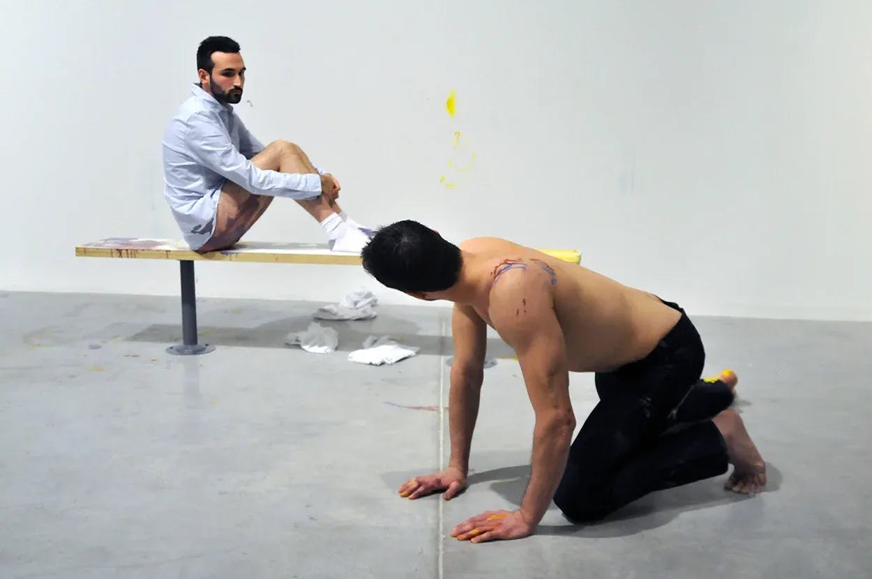 Jonathan VanDyke, Durational Performance for Two Men, 2009. Performance with dripping paint and installation of canvas, felt and wood. Courtesy the artist.